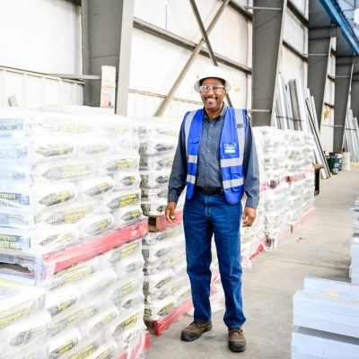 worker standing in front of concrete mix